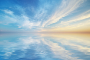 Sky background and water reflection.