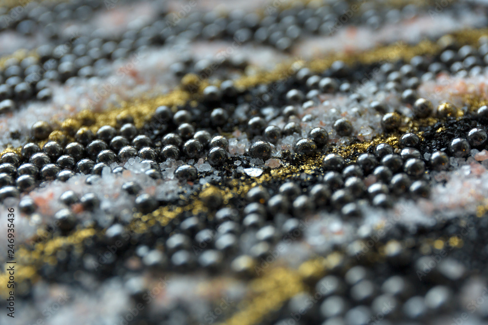 Layered blur sand pattern. Marble style background. Black and gold powder defocused texture. Layered blur sand pattern. Marble style background. Black and gold powder defocused texture.