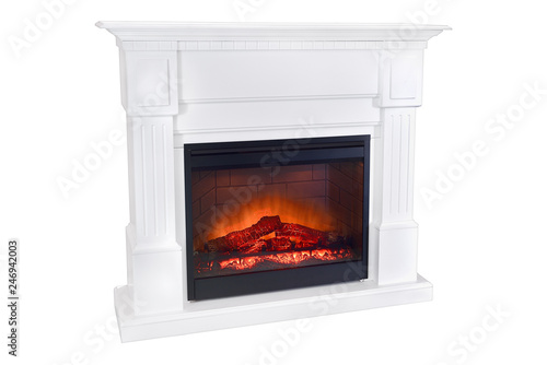 White wooden burning fireplace with roaring flames  classic elegant design. Isolated on white background  clipping path included. Fireplace as a piece of furniture