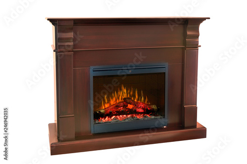 Brown wooden burning fireplace with roaring flames  with classic elegant design. Isolated on white background  clipping path included. Fireplace as a piece of furniture