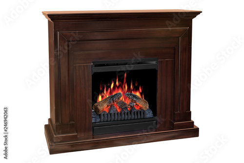Brown wooden burning fireplace with roaring flames, with classic elegant design. Isolated on white background, clipping path included. Fireplace as a piece of furniture