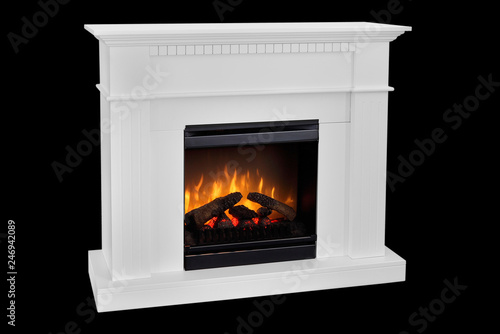 White wooden fireplace with roaring flames  classic elegant design. Isolated on black background  clipping path included. Fireplace as a piece of furniture