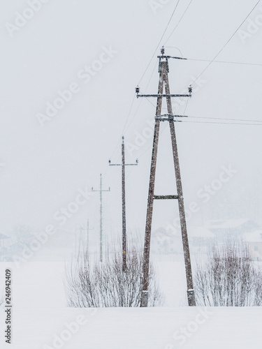 Power lines in the snowstorm in Ebbs, Tirol, Austria