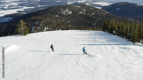 Two Snowboarding People Drone Aerial Follow Behind Amazing Birds Eye View Snowboard Extreme Winter Sport Downhill Ski Slope