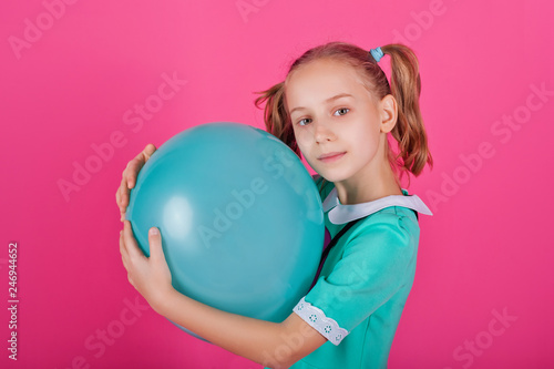little girl with balloons