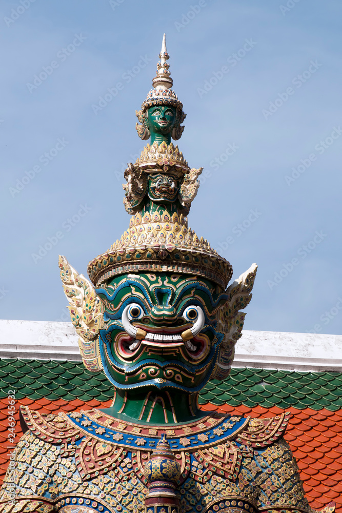 Bangkok Thailand, Giant demon guardian at the Grand Palace and Wat Phra Kaew with 3 stacked heads