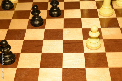 Chessboard with black pieces like a skill theme
