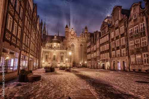 Gdansk winter street and view on Royal Chapel and St Mary's Church, Poland
