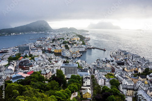 Panoramic view of the archipelago, the beautiful Alesund town centre and the amazing Sunnmore Alps from Fjellstua  Viewpoint, More og Romsdal, Norway