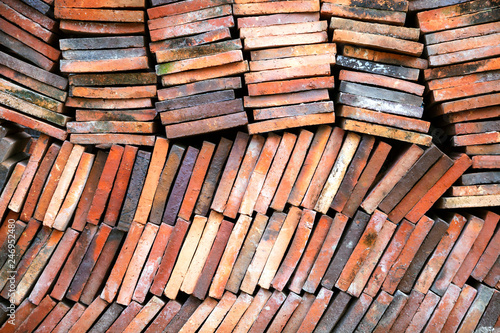 Background of old clay tiles in a pile