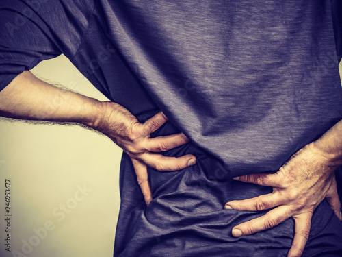 Man having back loins pain ache