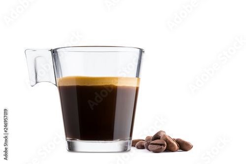 Black coffee in glass cup with coffee beans on white background