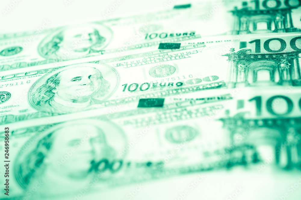 Fototapeta premium Close-up view of cash money euro and dollars bills background. Finance and business concept.