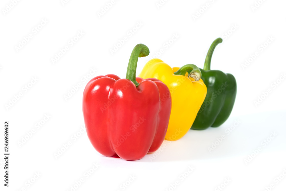 Red, yellow, green fresh and healthy peppers on white background Red, yellow, green fresh and healthy peppers on white background