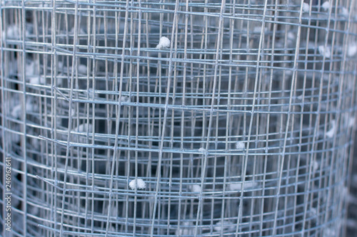 Galvanized welded wire mesh twisted into a roll