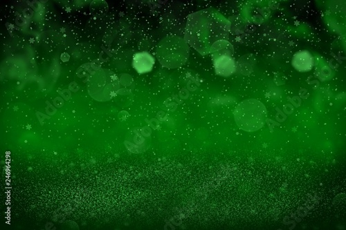green pretty bright glitter lights defocused bokeh abstract background and falling snow flakes fly, festive mockup texture with blank space for your content