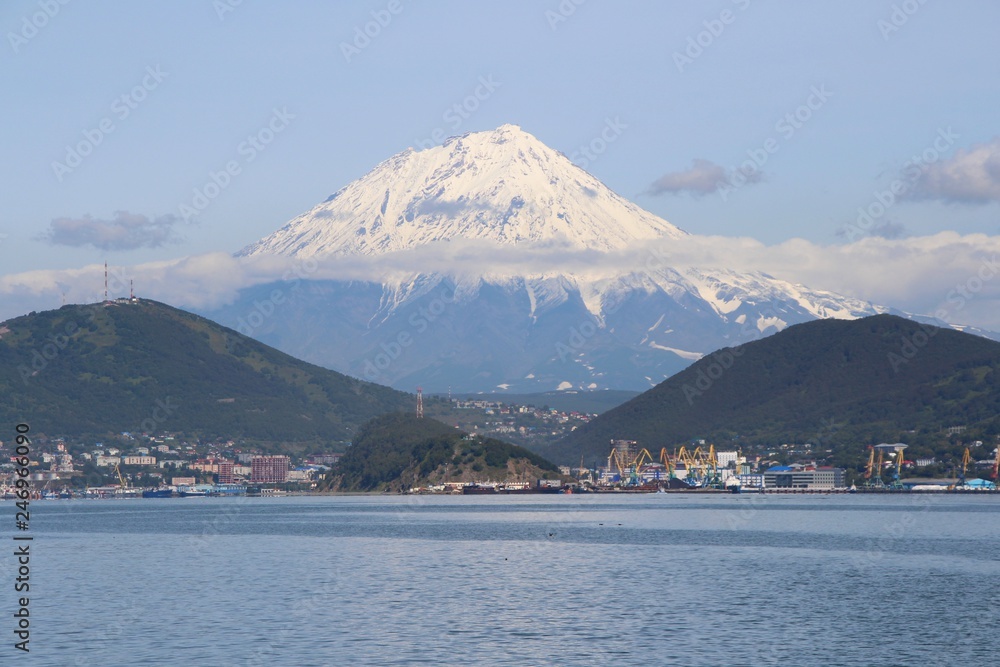 Koryaksky volcano towers over the city of Petropavlovsk-Kamchatsky. Koryaksky or Koryakskaya Sopka is an active volcano on the Kamchatka Peninsula in the Russian Far East.