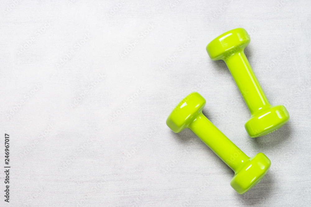 Dumbbells on white background top view. Dumbbells on white background top view.