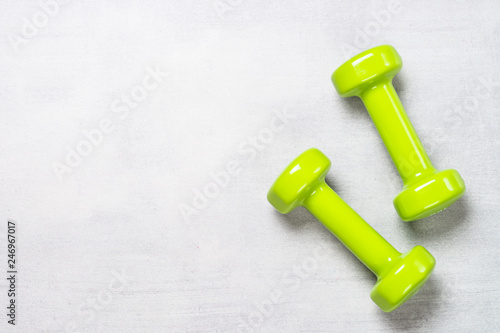 Dumbbells on white background top view.