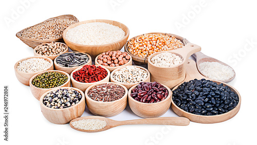 Cereal grains , seeds, beans on wooden background