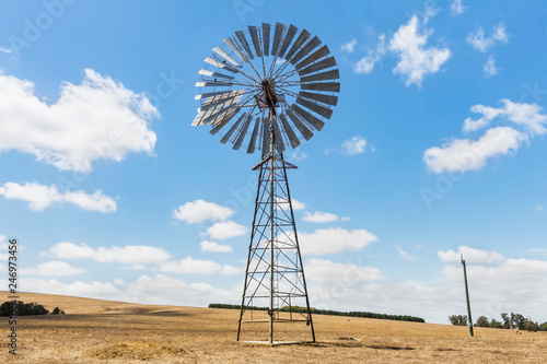 An old style Windmill in Rural landscape Western Australia 