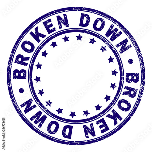 BROKEN DOWN stamp seal watermark with distress texture. Designed with round shapes and stars. Blue vector rubber print of BROKEN DOWN title with unclean texture.