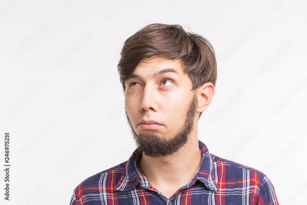Process, problem, people concept - young man thinking about problem Process, problem, people concept - young man thinking about problem