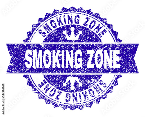 SMOKING ZONE rosette stamp watermark with distress style. Designed with round rosette, ribbon and small crowns. Blue vector rubber watermark of SMOKING ZONE caption with retro style.