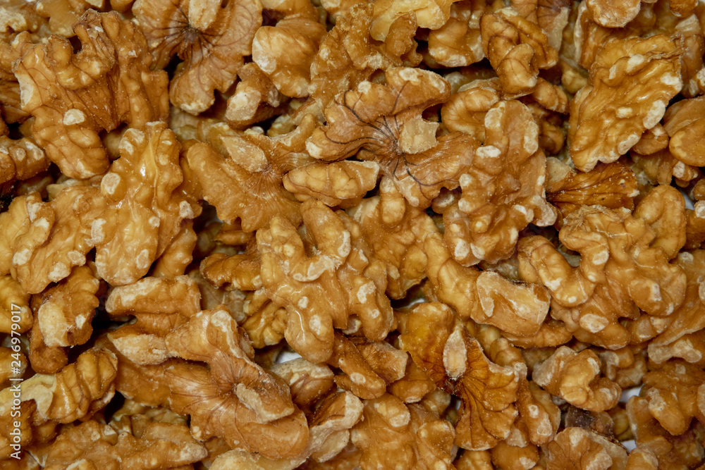 Pile of peeled walnuts, closeup. Pile of peeled walnuts, closeup.