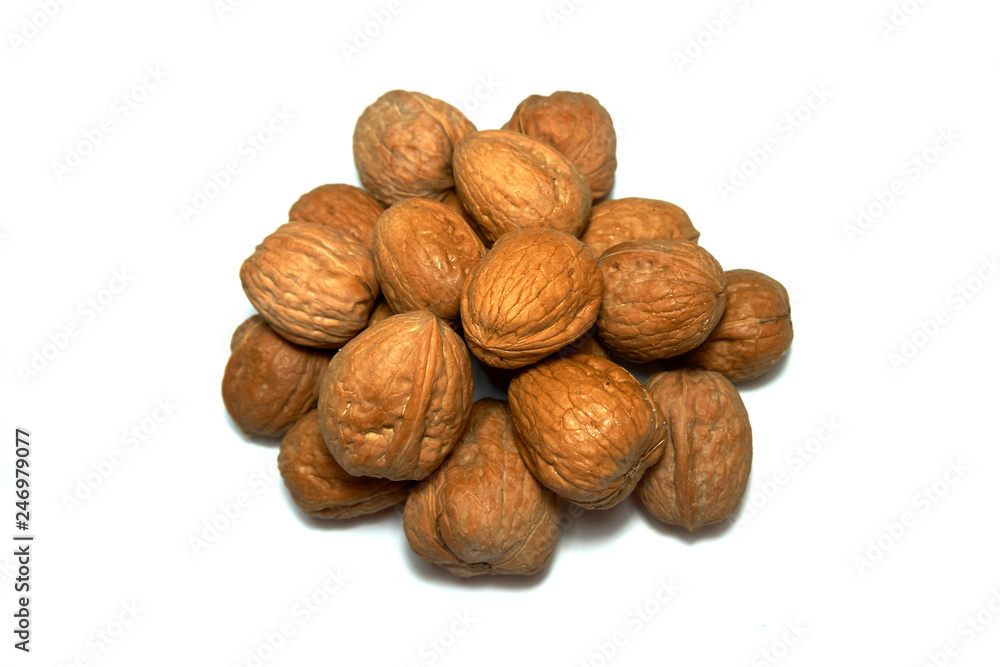 Pile of Whole walnuts isolated on white background Pile of Whole walnuts isolated on white background