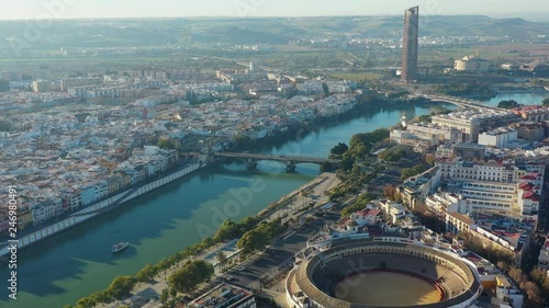 Aerial view of Seville, famous European historic city and capital of Andalusia, (corrida bullring) bullfighting arena (Plaza de toros de la Real Maestranza de Caballeria de Sevilla) - Spain, Europe