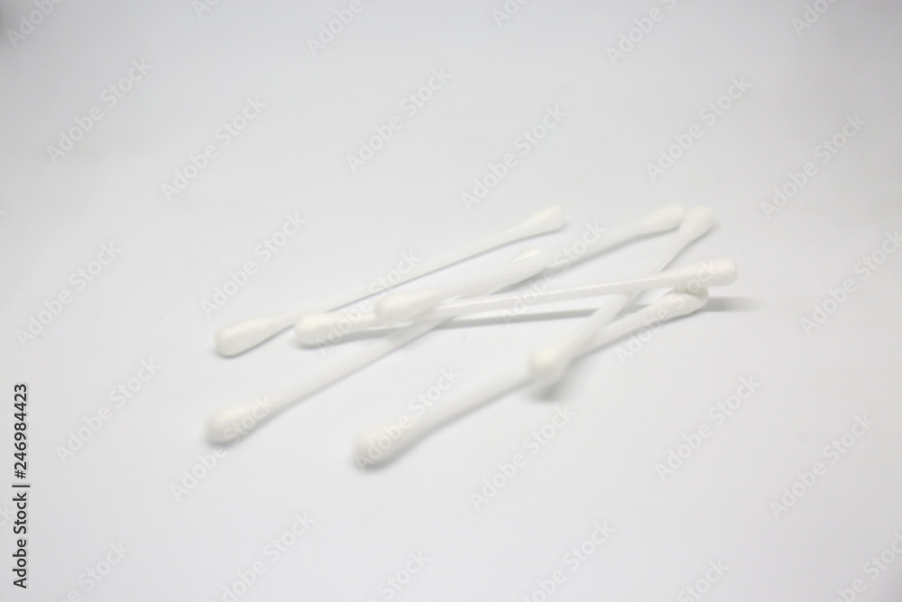 Cotton swabs (American English) or cotton buds Cotton swabs (American English) or cotton buds