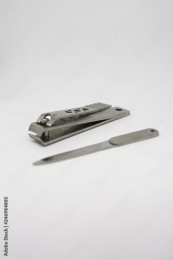 A nail clipper is a hand tool used to trim fingernails A nail clipper is a hand tool used to trim fingernails