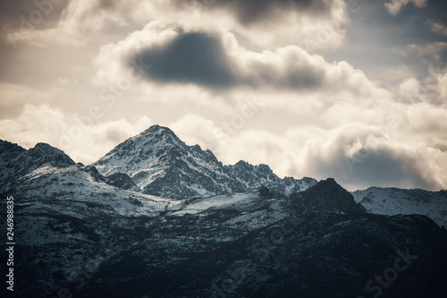 Snow capped peak of Monte San Parteo mountain in Corsica © Jon Ingall