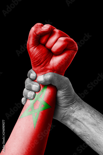 Fist painted in colors of Marocco flag, fist flag, country of Marocco