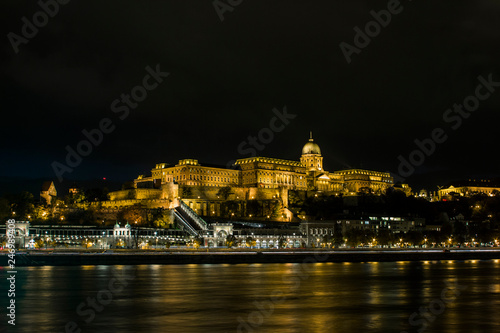 Buda Castle on the banks of the Danube River in Budapest at night. Hungary © Shyshko Oleksandr