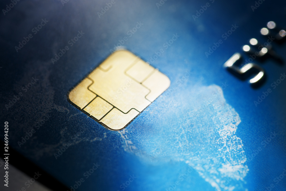 Low key macro shot with credit card. Low key macro shot with credit card.