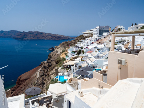 Greece. Breathtaking beautiful landscape of houses and fascinating blue water in village on Santorini Greek island in Aegean sea. June  2018