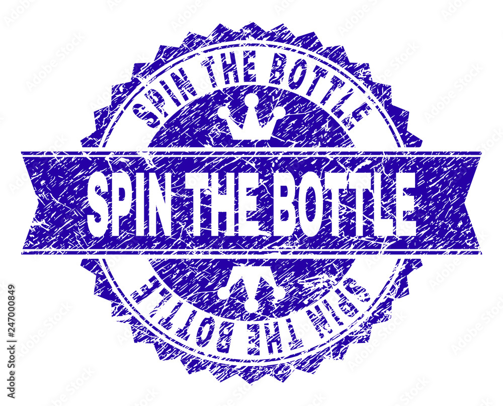 SPIN THE BOTTLE rosette stamp seal overlay with grunge texture. Designed with round rosette, ribbon and small crowns. Blue vector rubber watermark of SPIN THE BOTTLE caption with dirty texture. SPIN THE BOTTLE rosette stamp seal overlay with grunge texture. Designed with round rosette, ribbon and small crowns. Blue vector rubber watermark of SPIN THE BOTTLE caption with dirty texture.