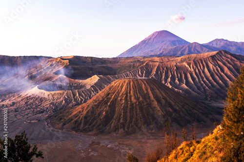 Mount Bromo (Gunung Bromo) during sunrise from viewpoint; is an active volcano and part of the Tengger massif, in East Java, Indonesia. Beautiful landscape and popular destinations in Indonesia.
