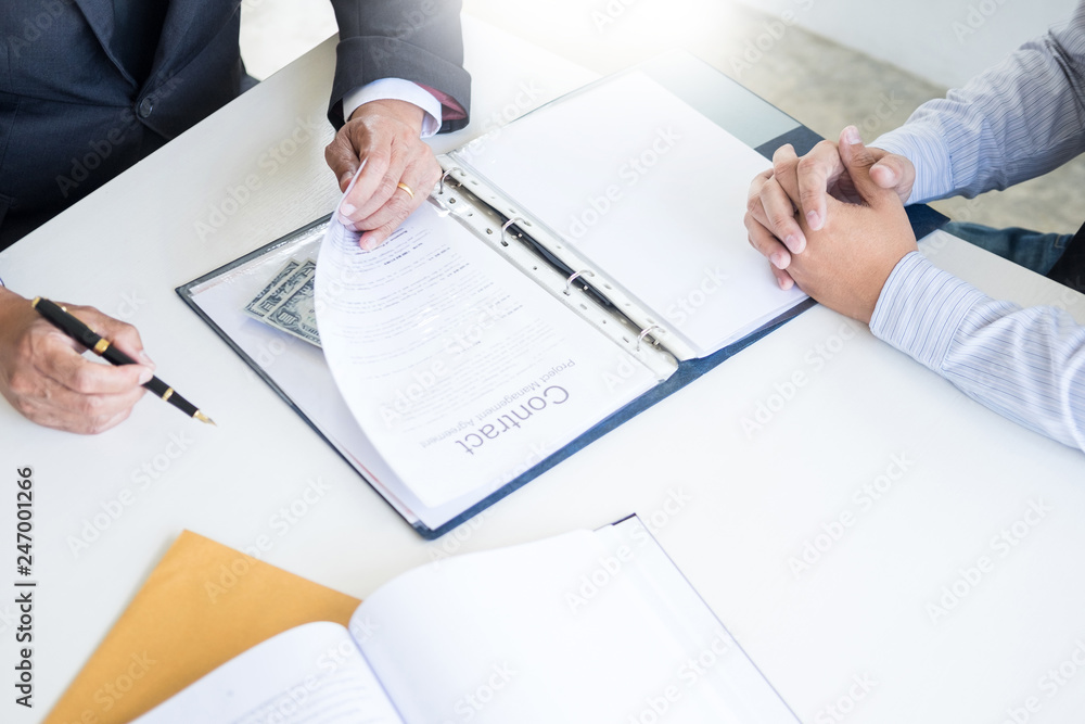 Businessman receive money in the envelope offered in file taking bribe and signing a contract - anti bribery and corruption concepts. Businessman receive money in the envelope offered in file taking bribe and signing a contract - anti bribery and corruption concepts.