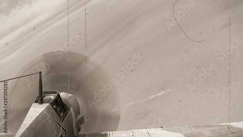 Dogfight - Air combat between two propeller military fighter aircrafts from the WW2 - old vintage movie loock