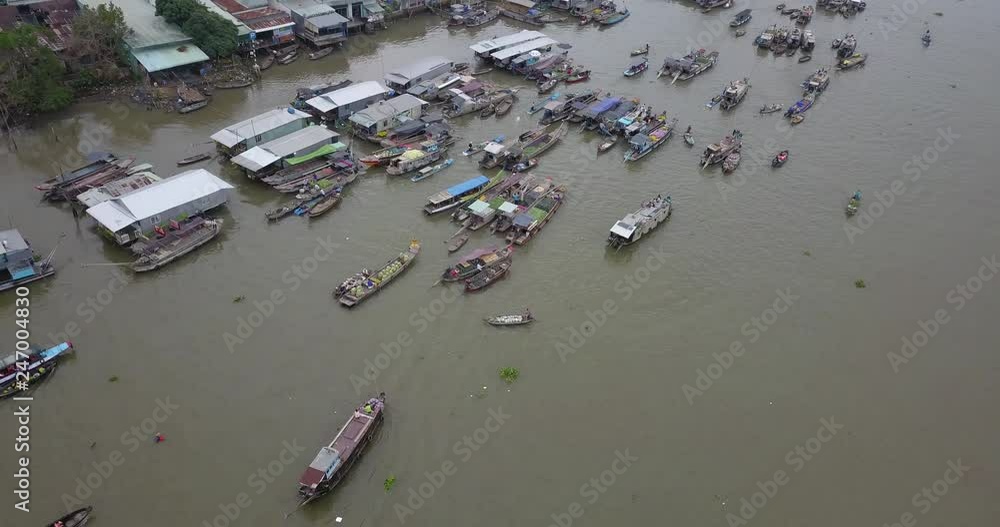 Tourists and people buy and sell food, vegetable, fruits on boat, ship in Cai Rang floating market, Mekong River. Royalty free stock video traffic on floating market or river market, Can Tho, Vietnam Tourists and people buy and sell food, vegetable, fruits on boat, ship in Cai Rang floating market, Mekong River. Royalty free stock video traffic on floating market or river market, Can Tho, Vietnam