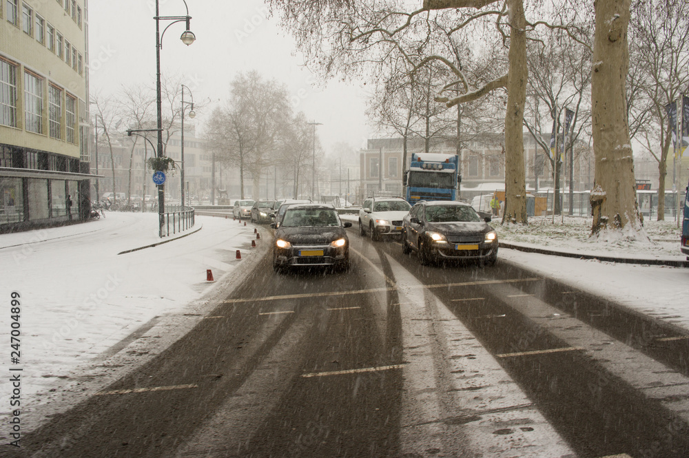 Cars during snowfall