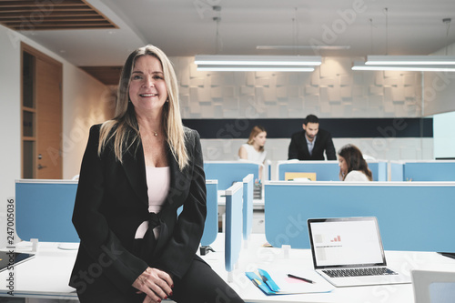 Portrait Of Mature Business Woman As Manager In Coworking Office Space