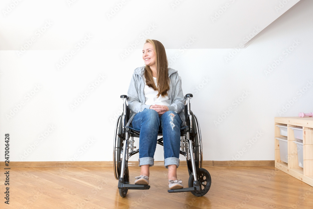 Handicapped woman sitting in wheelchair and smile. Handicapped woman sitting in wheelchair and smile.