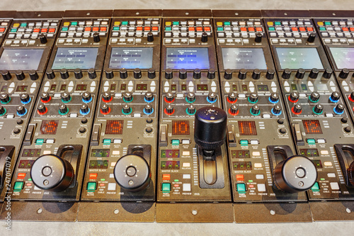 The control panel on television that regulates the operation of multi-camera filming during a live broadcast via satellite television communications photo