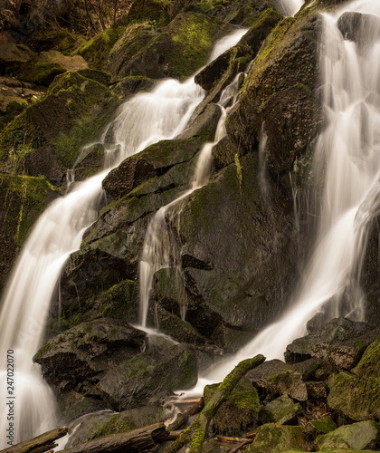 Smalle waterfall in the forest photo