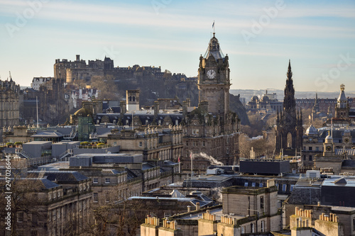 view of city of edinburgh with the castle in the background © Joulian