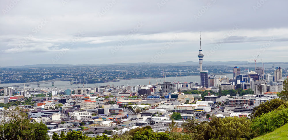 Overlook from Mt. Eden of the Auckland, New Zealand central business district and harbour bridge